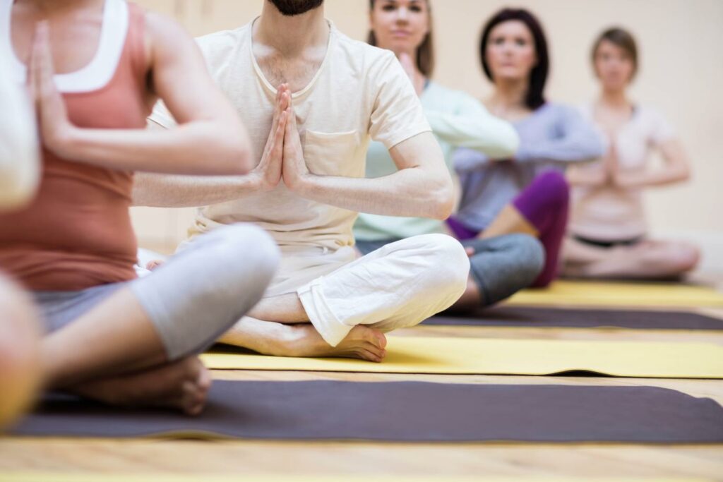 group people sitting lotus position 1 1